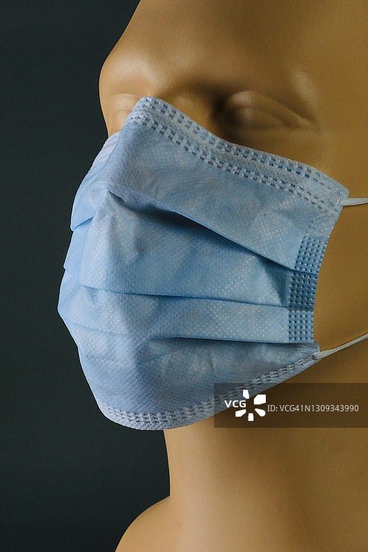 戴新冠口罩的人体模型图片素材