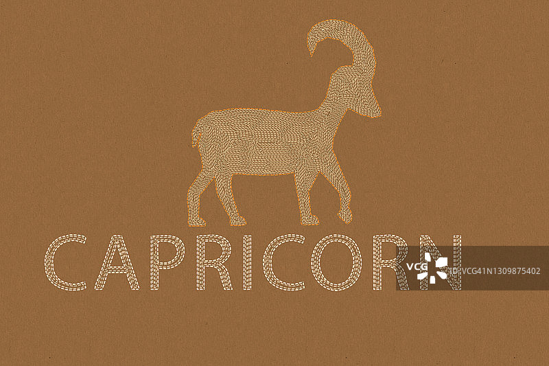 纸艺棕色背景下的摩羯座星座图片素材