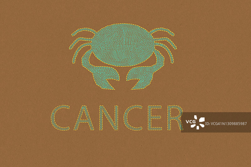 纸艺棕色背景上的巨蟹座星座标志图片素材