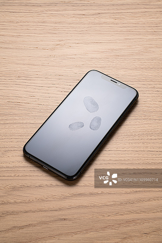 手机屏幕上的指纹图片素材