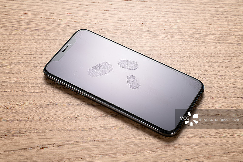 手机屏幕上的指纹图片素材