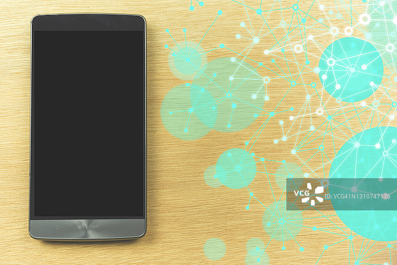 办公桌上的智能手机图片素材