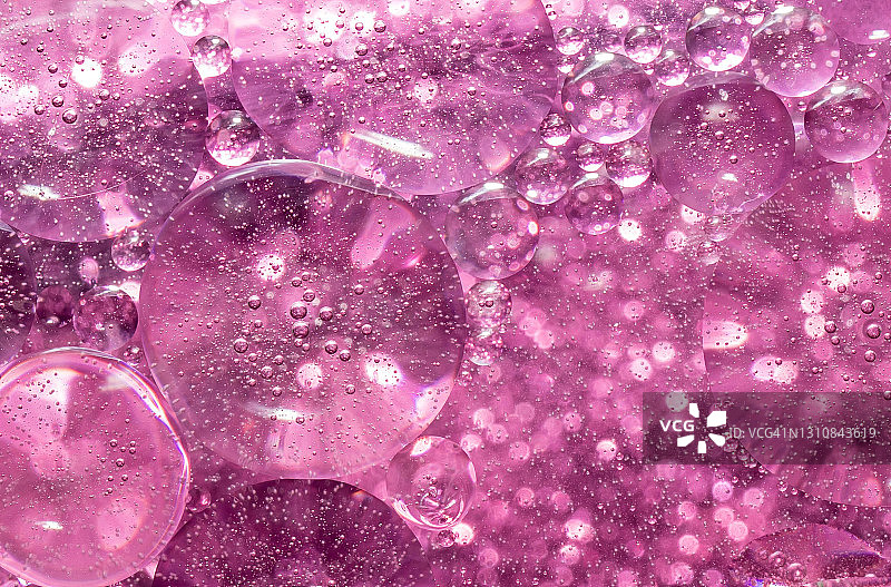 水面漂浮油彩的微距抽象照片图片素材