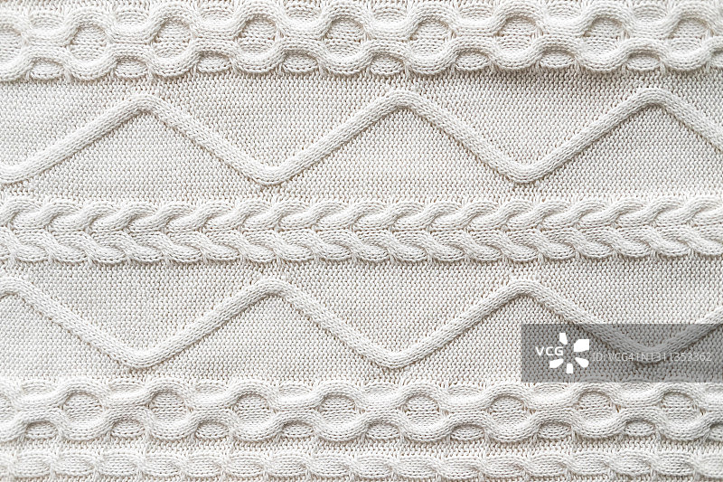 光滑的白色针织毛衣纹理与图案，扁平风格特写图片素材