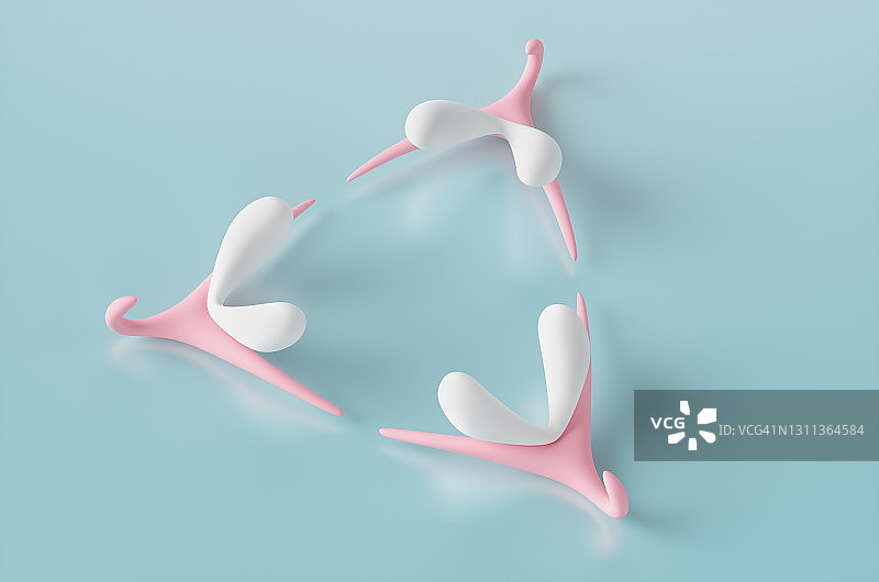 蓝色背景上的三个女性阴蒂器官医学模型，3D渲染图图片素材