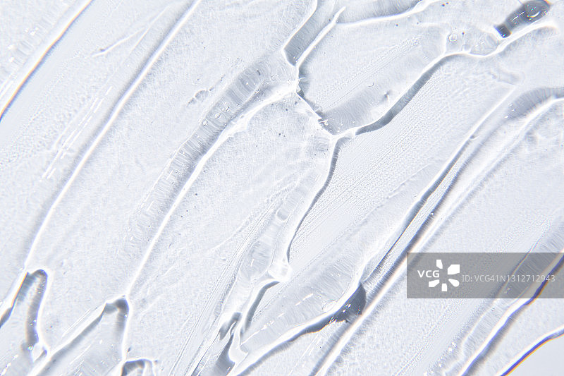 凝胶霜质地，白色背景上的透明质酸凝胶图片素材