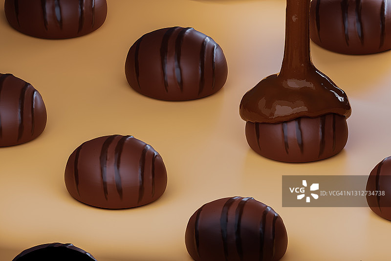 将液态巧克力糖浆倒在糖果上的特写图片素材