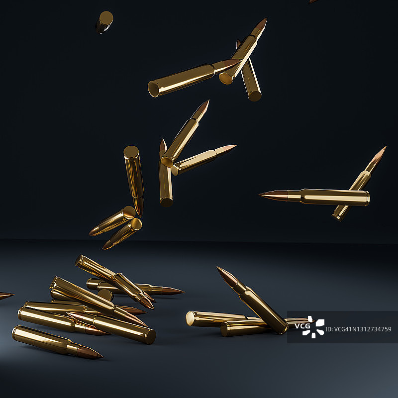 深色背景上掉落的金属步枪子弹图片素材