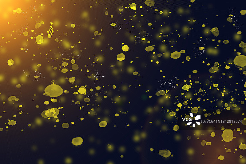 黑色背景与明亮的黄色油漆飞溅图片素材