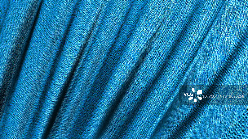 有褶皱的蓝色织物材料3D渲染图片素材