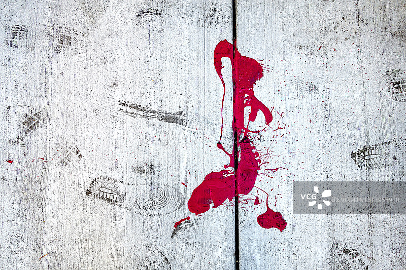 人行道上的鞋印和油漆图片素材