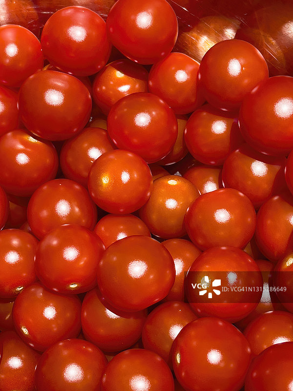 杂乱的樱桃番茄堆抽象图案图片素材