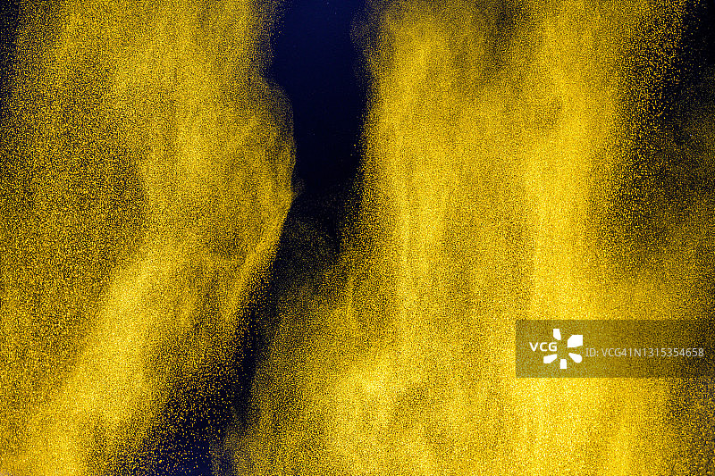 空气中飞舞的姜黄粉图片素材