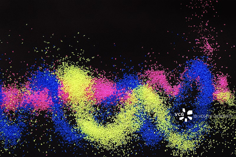黑色背景上的彩色霓虹工艺沙图片素材