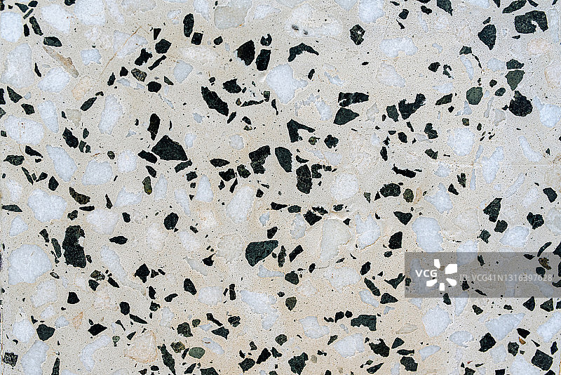 带有一些黑色的浅灰色水磨石（特写）图片素材