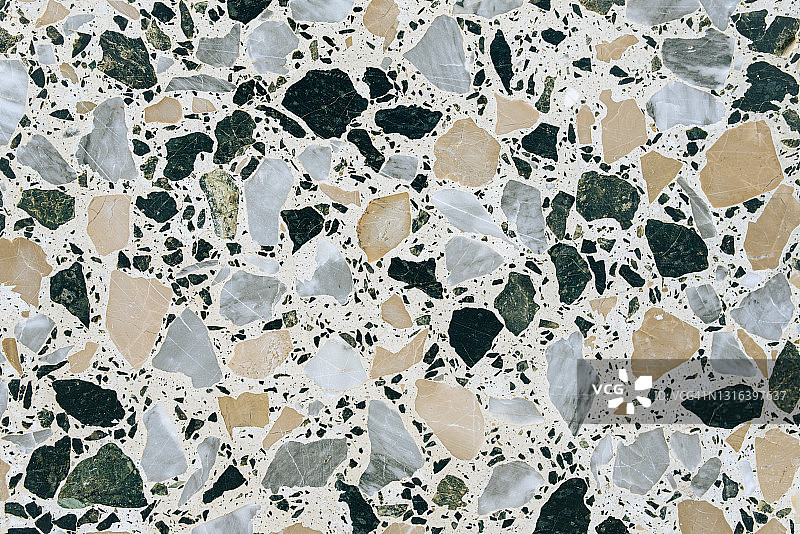 带有黑色、灰色和米色石材的水磨石特写图片素材