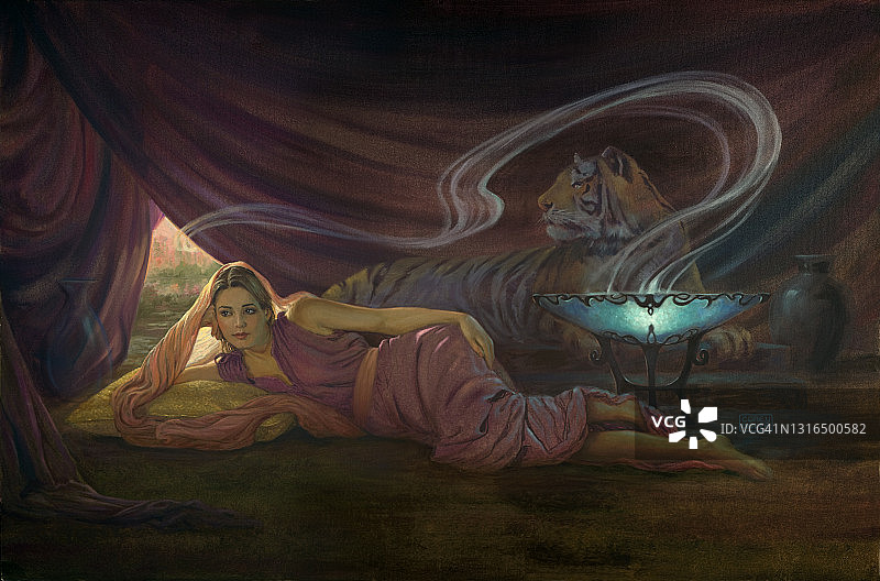 与老虎休闲的美丽女人图片素材