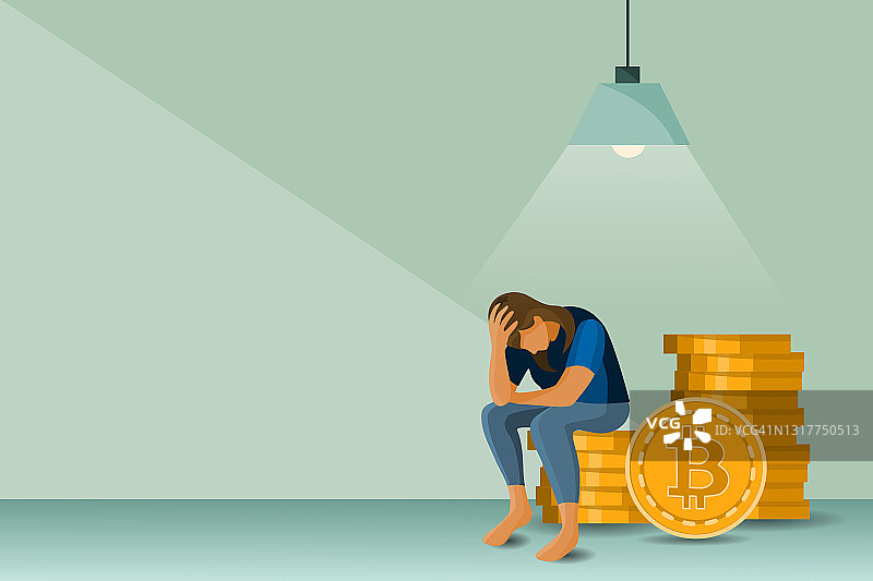 商业失败概念图：女性在比特币下跌时感到压力和悲伤图片素材