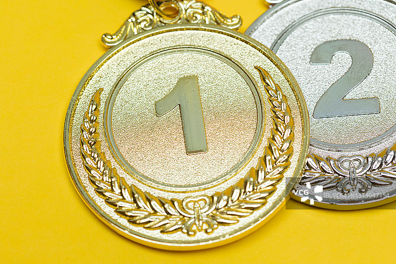 黄色背景体育成就金牌图片素材