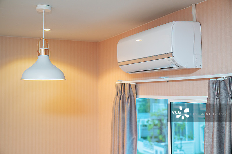 墙面背景上的空调图片素材