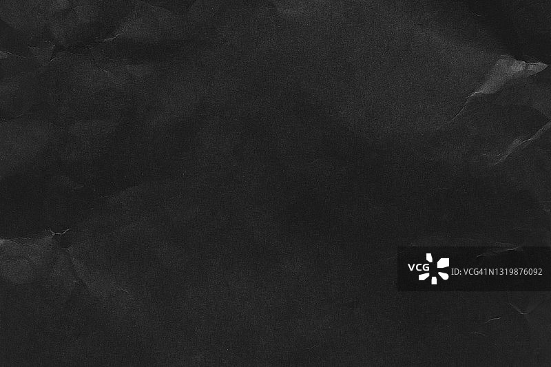 褶皱的黑色纸张纹理背景图片素材