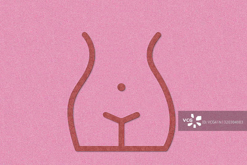 粉色背景上的粉色人体模型图片素材