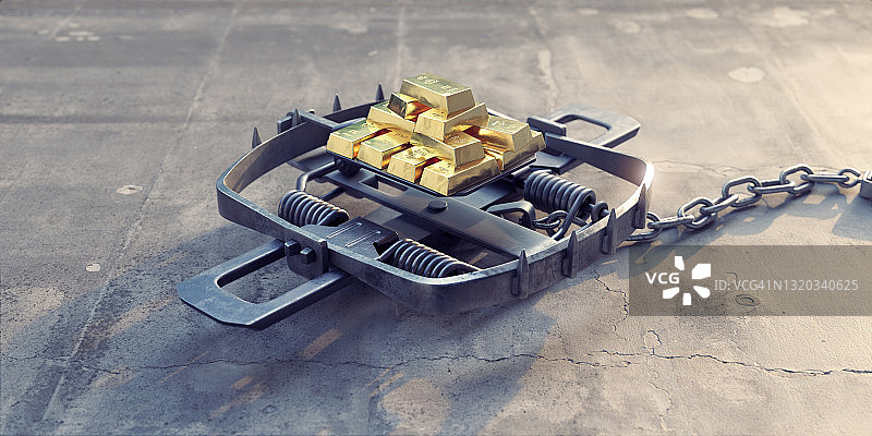以大量金条为诱饵的捕熊陷阱，展示风险与回报图片素材