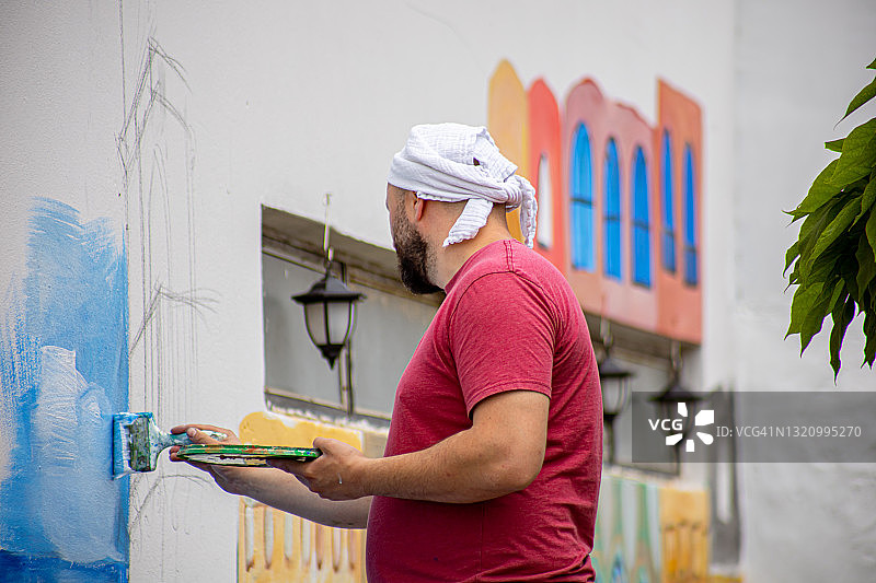 大画笔绘制壁画图片素材