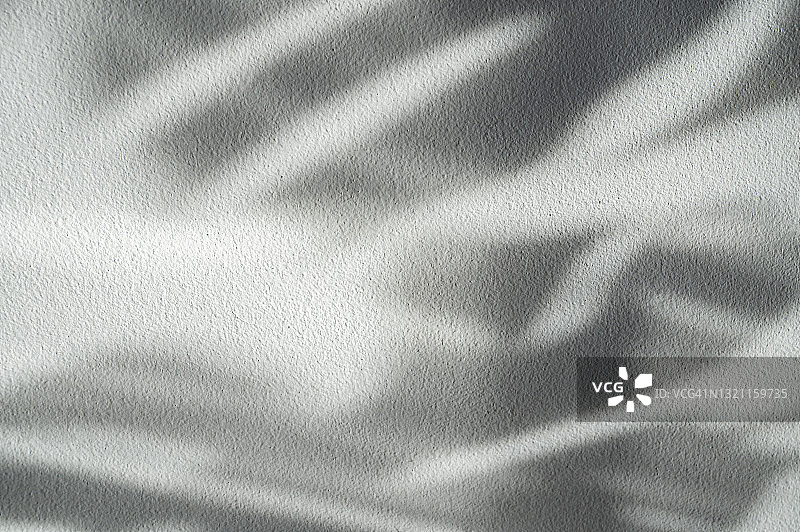 白色石膏墙上的阴影图案背景图片素材