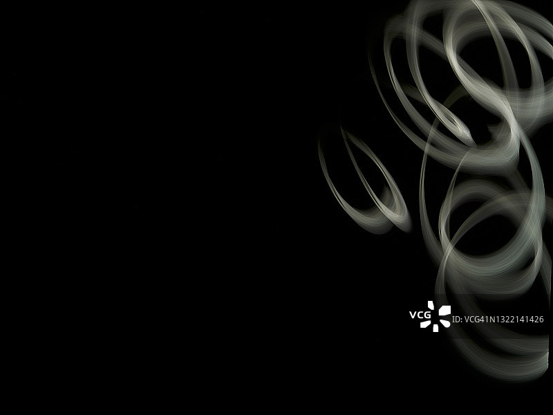 黑色背景上的模糊漩涡图片素材