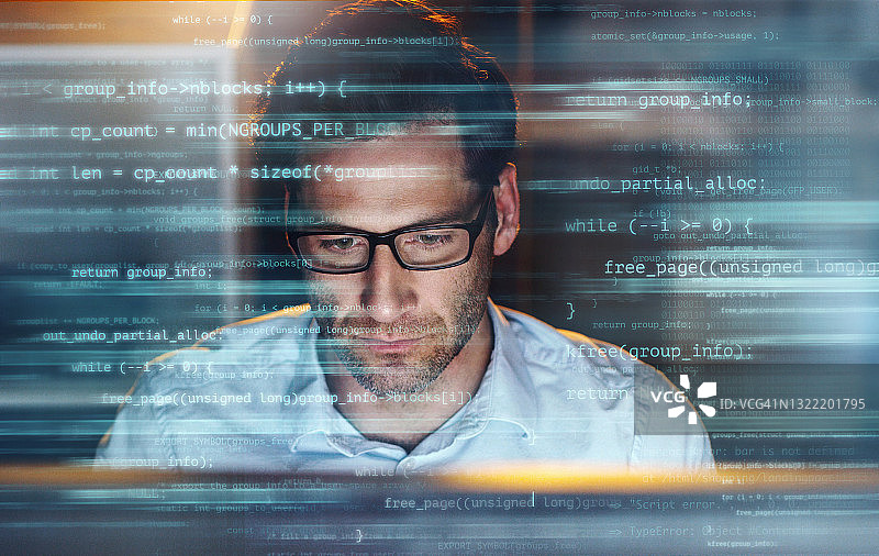 英俊商人办公室工作场景与多行代码叠加图片素材