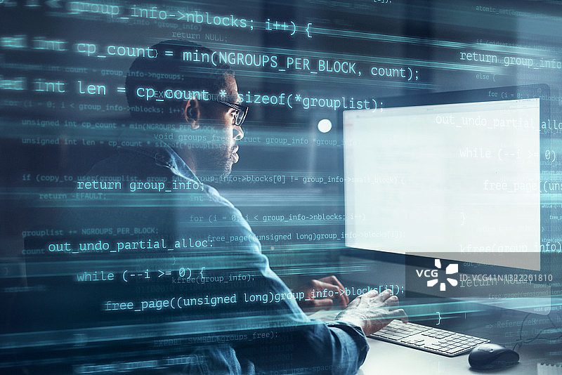 英俊商人办公室工作场景与多行代码叠加图片素材