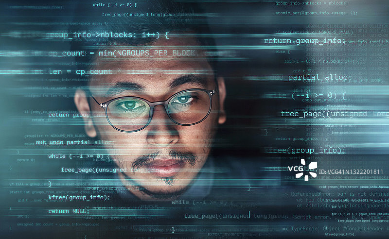 英俊商人办公室工作场景与多行代码叠加图片素材