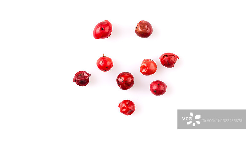 白色背景上分离的红花椒种子图片素材