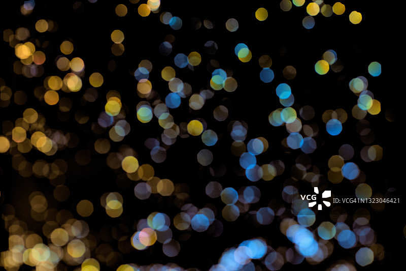 金色蓝色闪亮亮片黑色背景图片素材