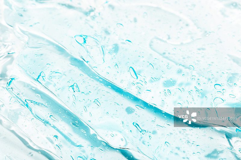 面部保湿透明质酸精华液，带气泡的头发凝胶，化妆和护肤美容产品图片素材