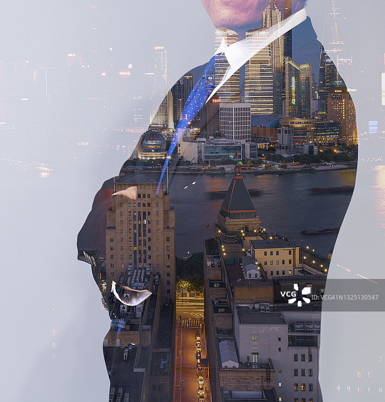 双重曝光照片一个商人和城市的观点图片素材