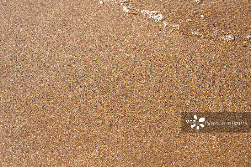 湿润的海滩图片素材