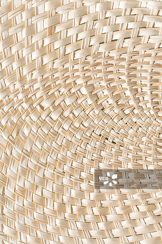 米色编织藤条扇形图案图片素材