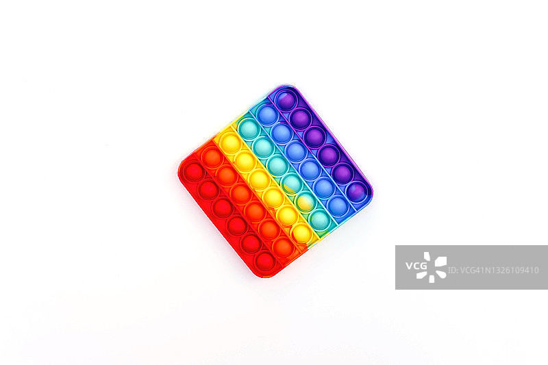 儿童和成人皆宜的流行玩具：Pop It图片素材