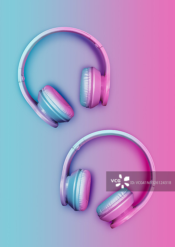 两对粉色和蓝色无线耳机的影棚照片图片素材