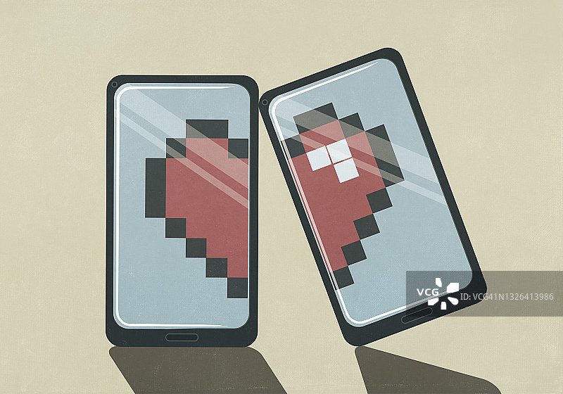 智能手机屏幕上的像素化破碎的心图片素材