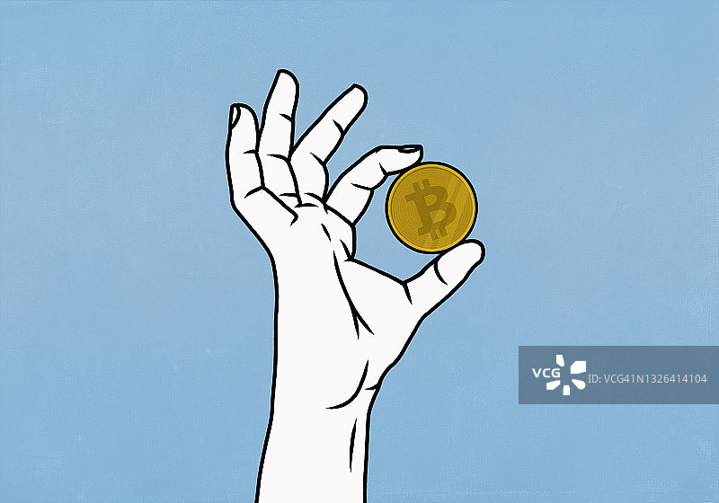 蓝色背景手持比特币特写图片素材
