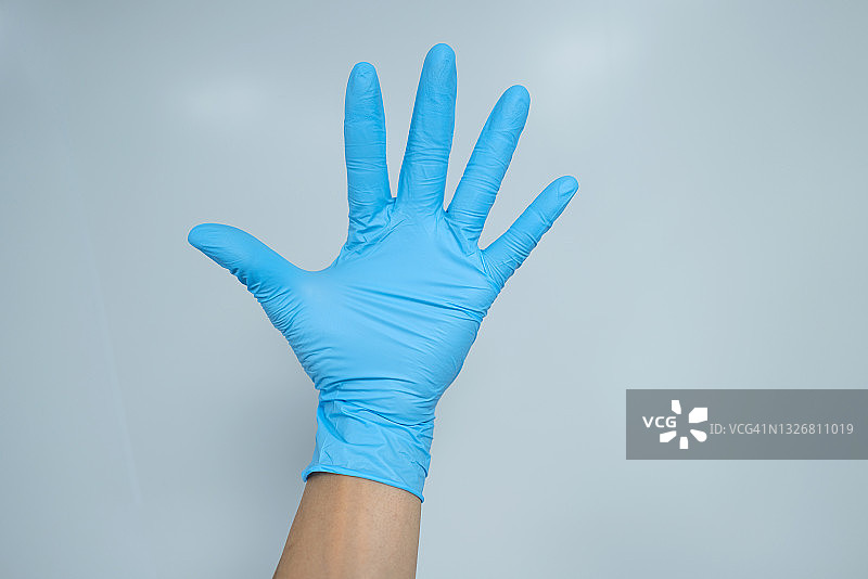 戴防护手套的手掌图片素材