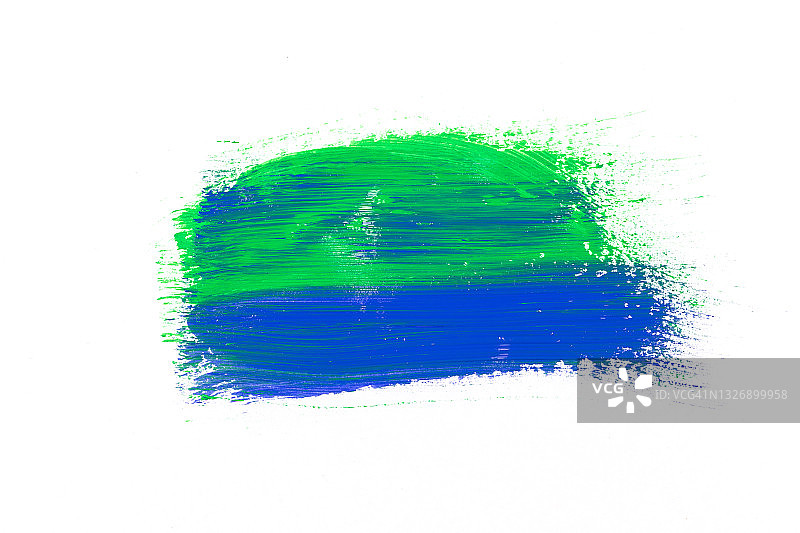 白色纸上绿蓝色笔刷痕迹图片素材