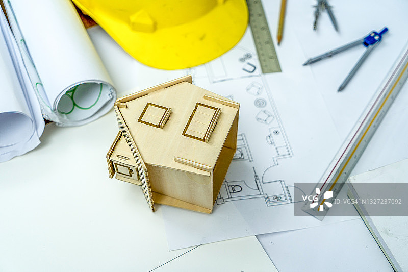 建筑设计图与房屋概念图、建筑师办公桌、工程蓝图、施工背景和工程器械图片素材