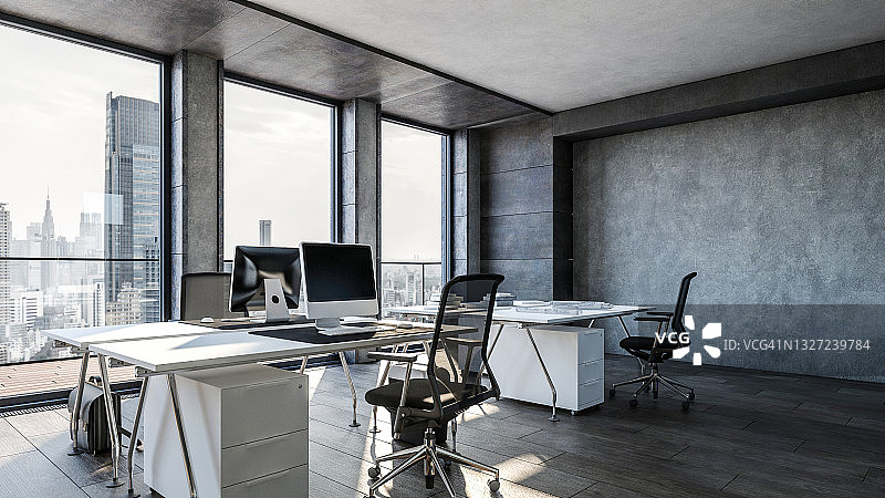 现代办公室的办公桌上的电脑图片素材