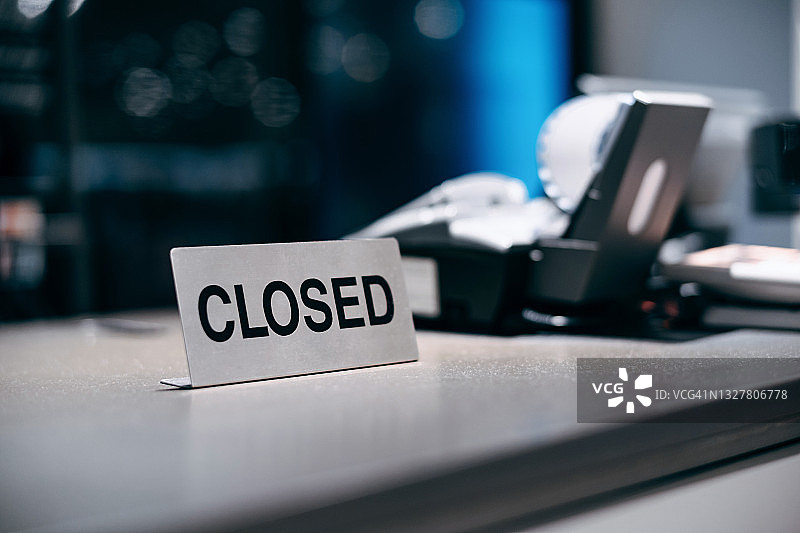 收银台上的暂停营业标志图片素材