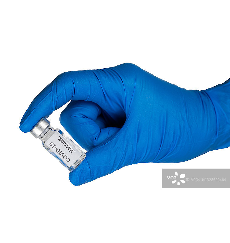 特写：医护人员手持COVID-19疫苗瓶，白色背景图片素材