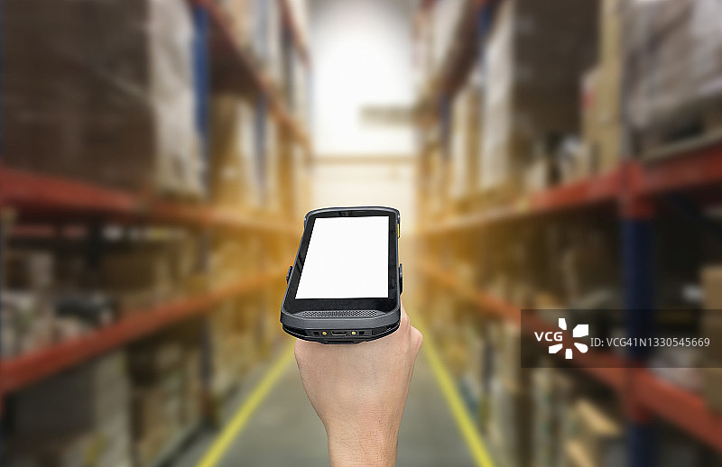 仓库中带有条形码扫描器的数字条形码扫描器图片素材